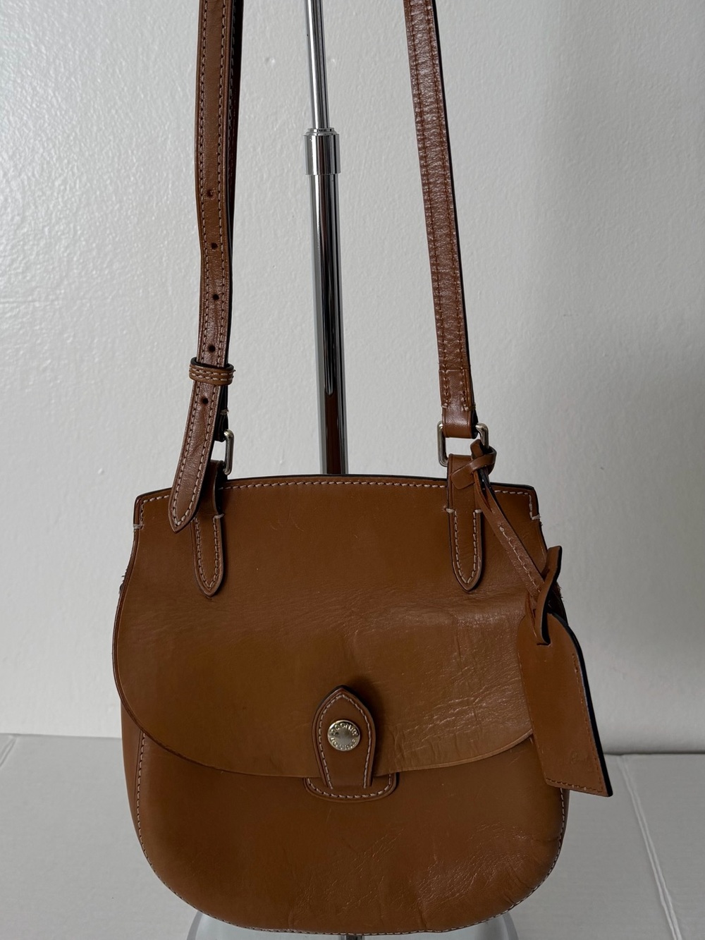 vintage Y2K brown leather crossbody saddle bag by Dooney & Bourke